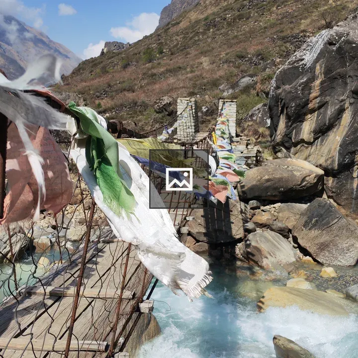 Suspension bridge with prayer flags