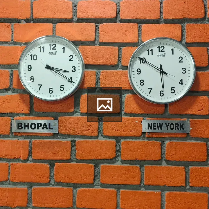 Clock on Orange Brick Wall