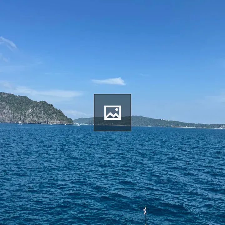 Calm Blue Lagoon with Limestone Peaks