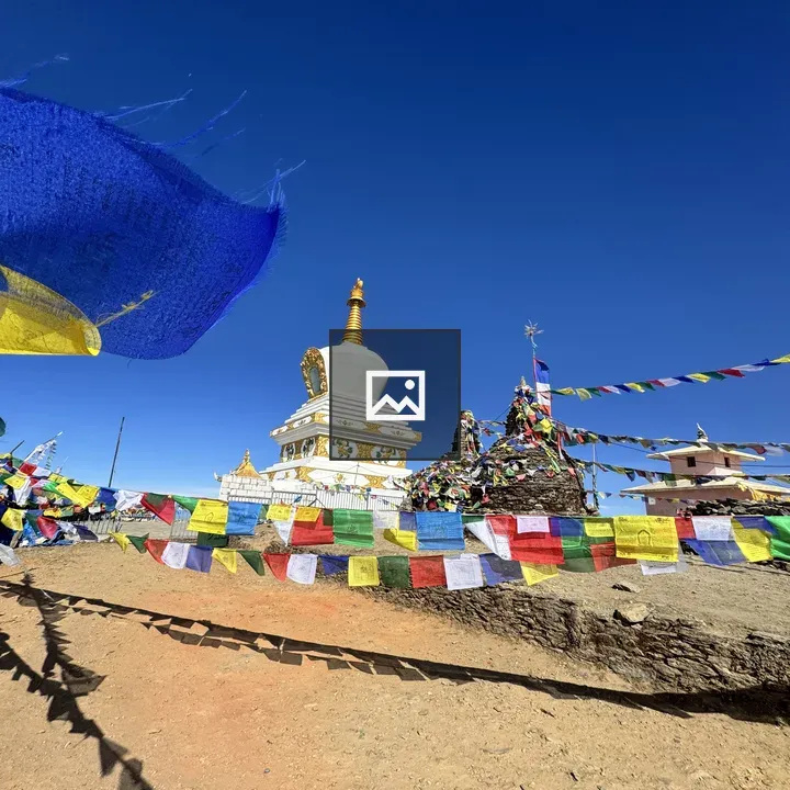 White Stupa with Golden Accents