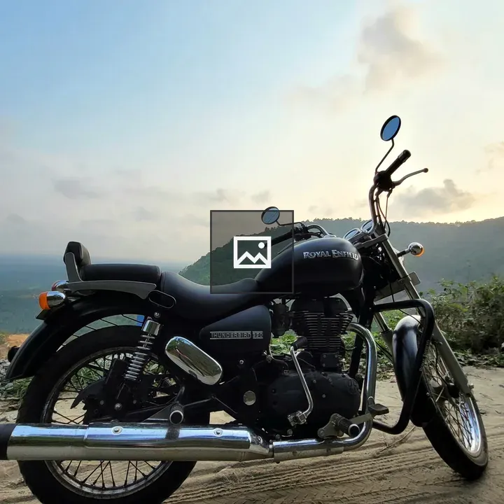Side view Royal Enfield on dirt road