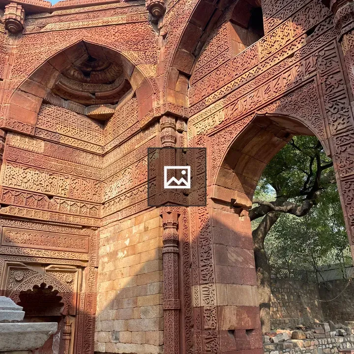 Red sandstone arches and carvings