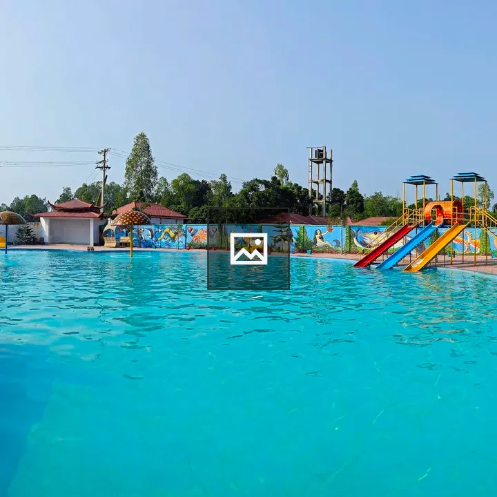 Panoramic pool with slides and murals