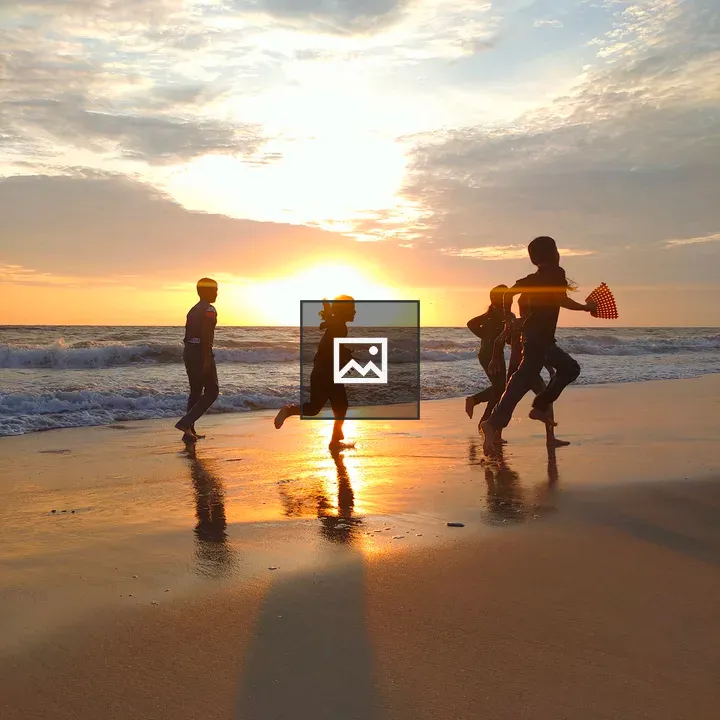 Children at Kozhikode Beach Sunset