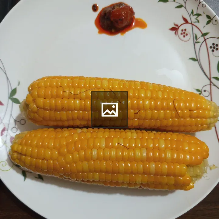 Two Ears of Corn on Plate