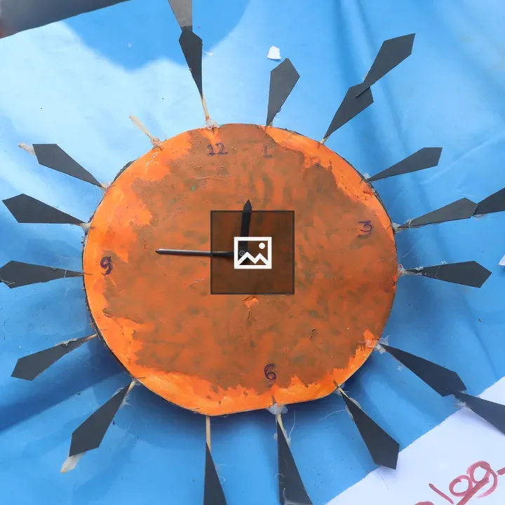 Handmade clock with orange face