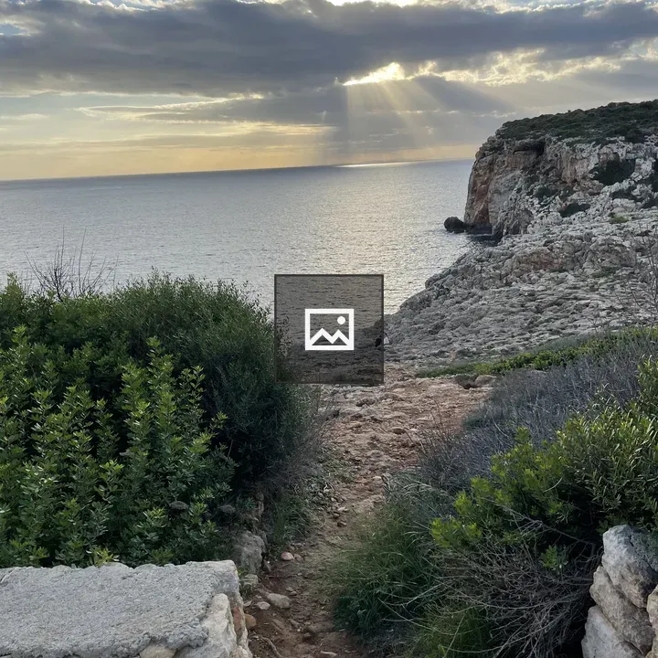 Rocky coastal path to the sea