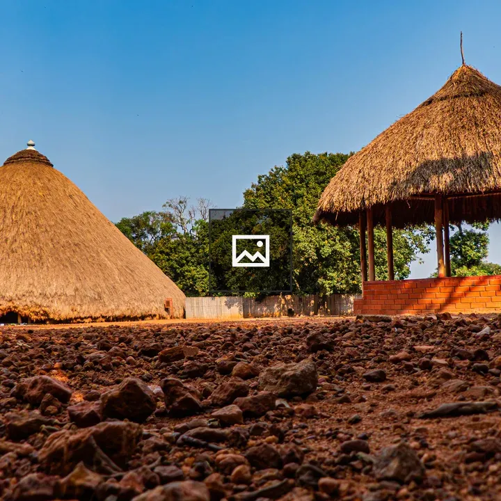 Rural homestead with thatched roofs