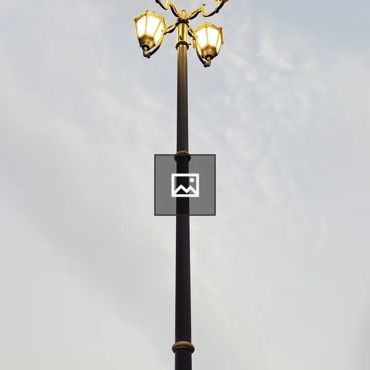 Tall street lamp with lanterns
