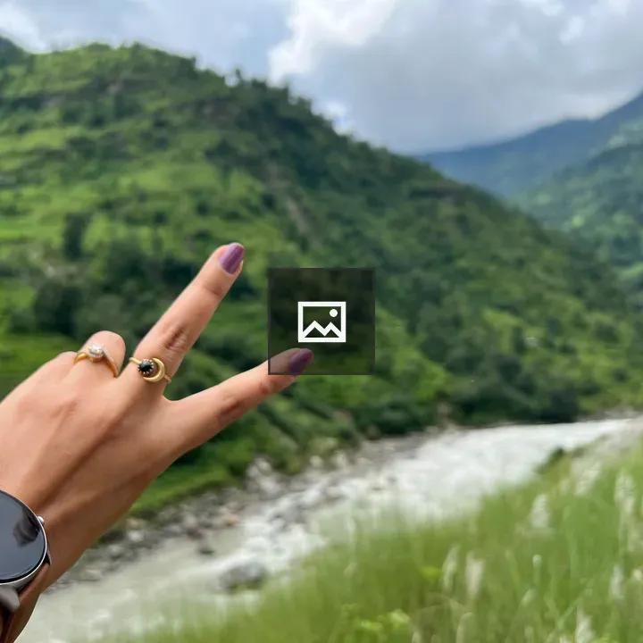 Hand with smartwatch and rings