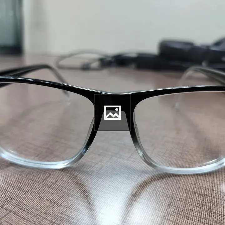Clear eyeglasses on table