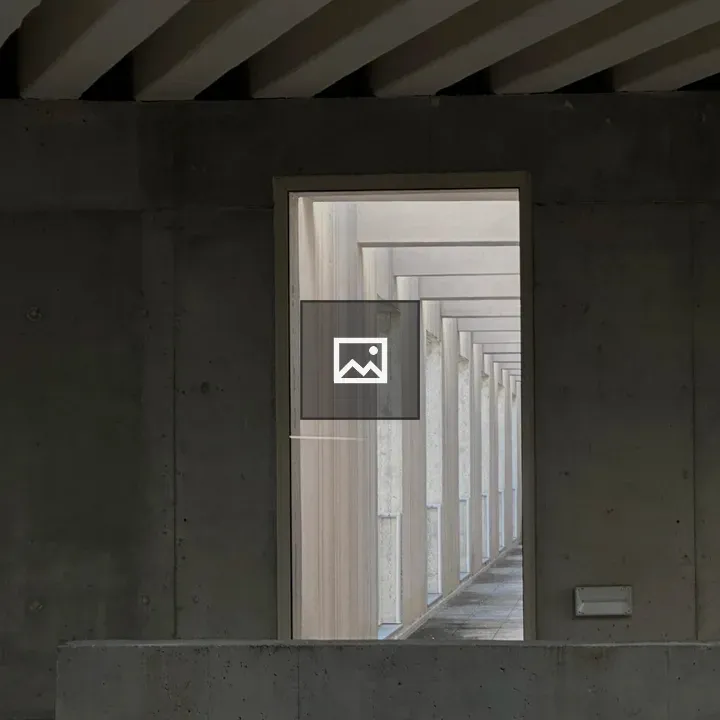 Rectangular window in concrete corridor