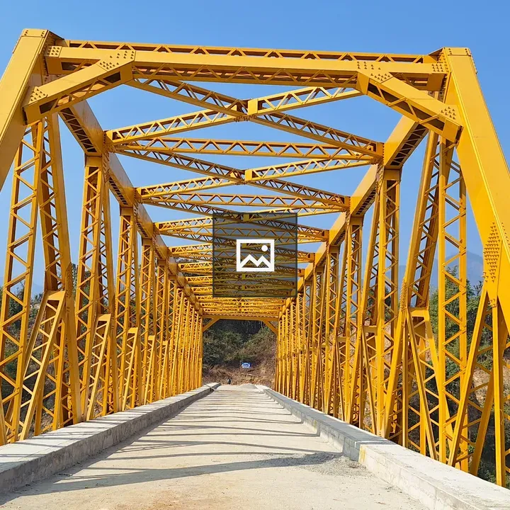 Yellow bridge over blue water