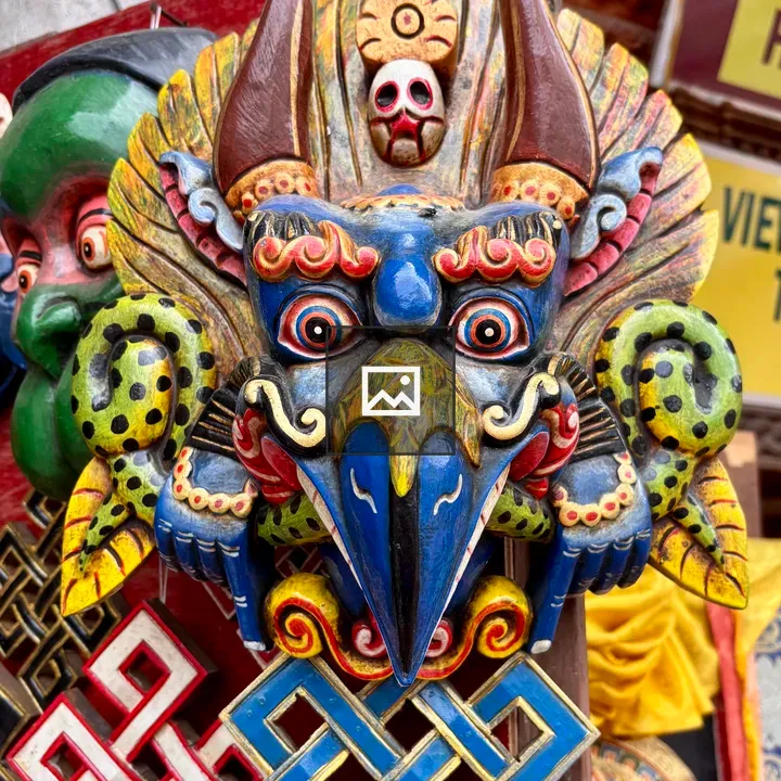 Colorful mask with bird motif
