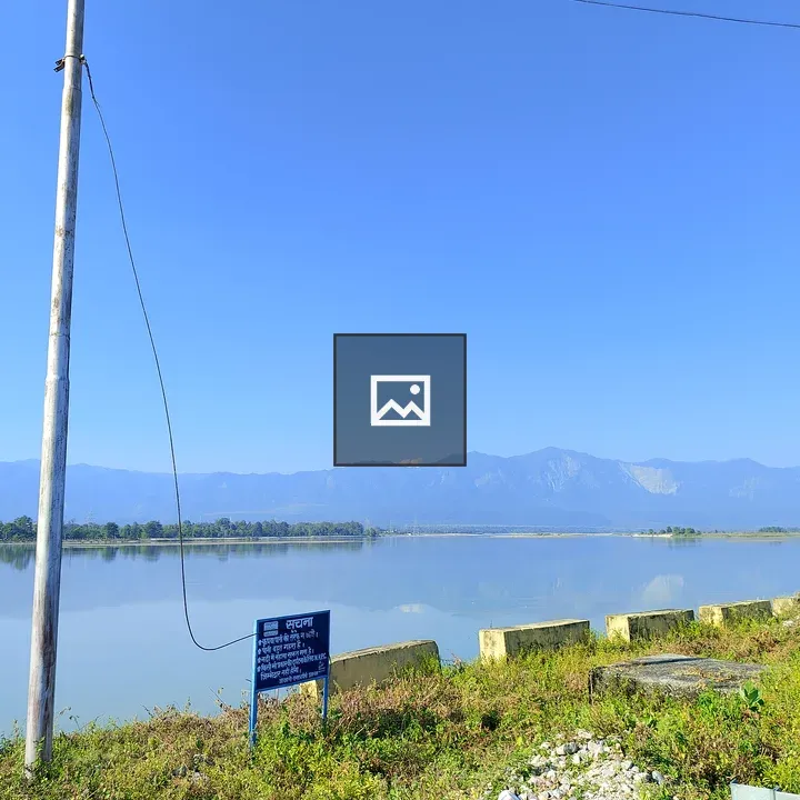 River scene with notice board