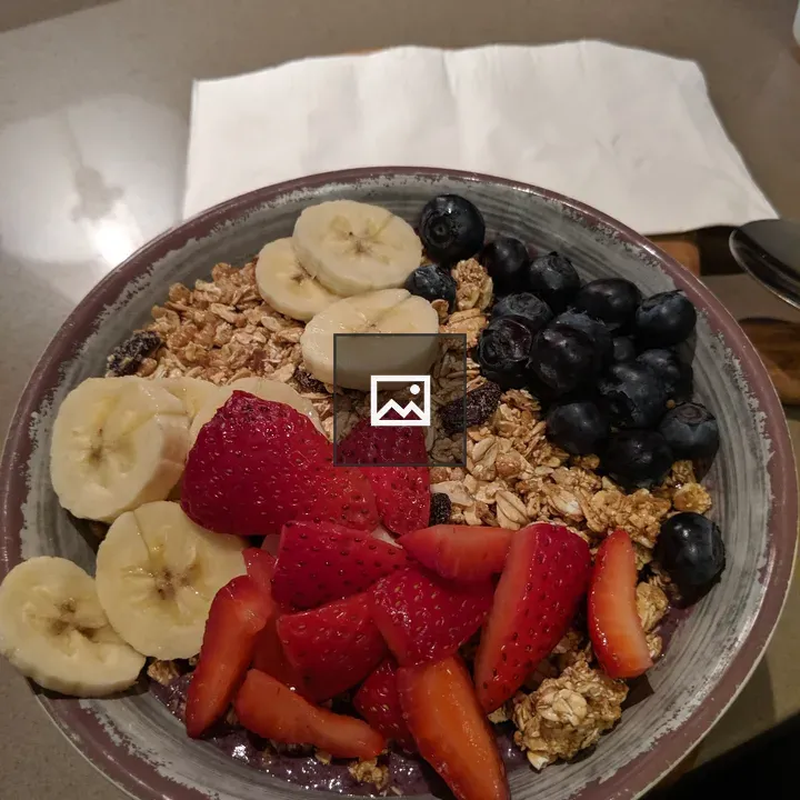 Bowl of Oatmeal with Bananas and Strawberries