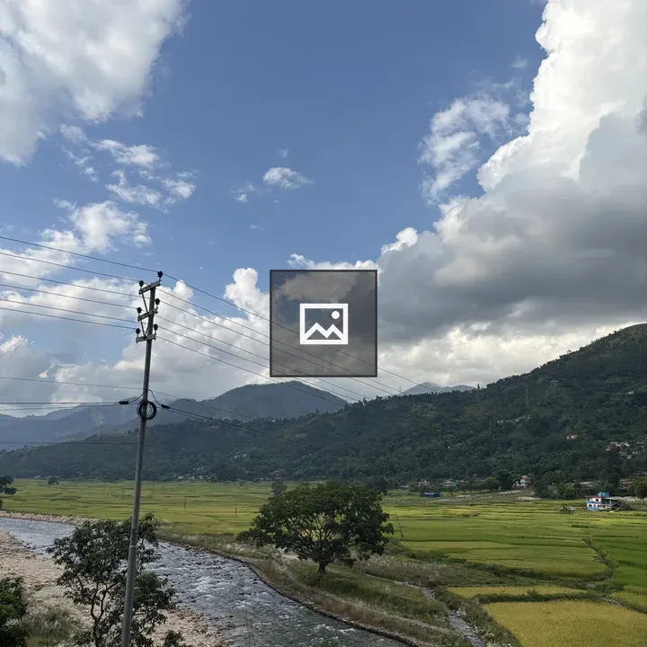 River Landscape with Green Fields