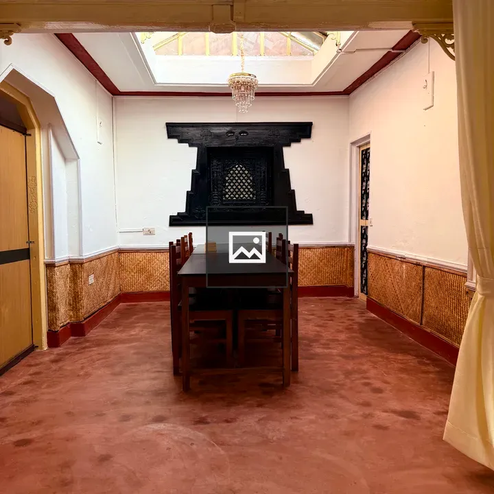 Dining area with long dark table