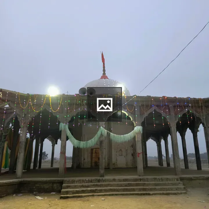 White temple with dome and lights