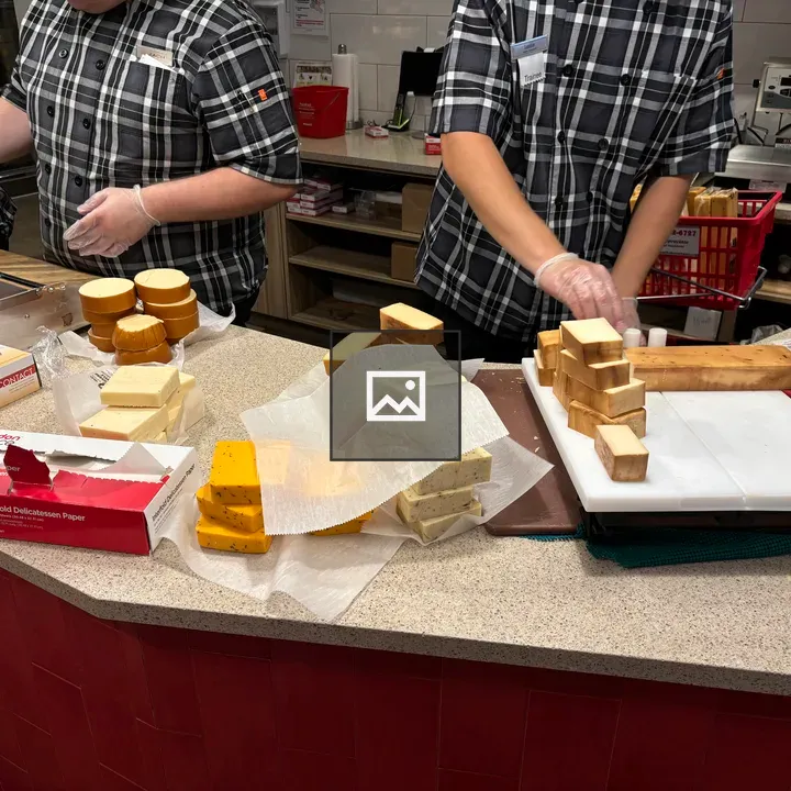 People Cutting Cheese