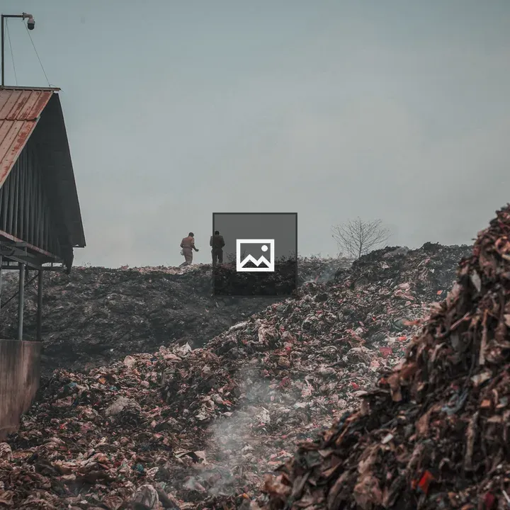 Two People at a Landfill