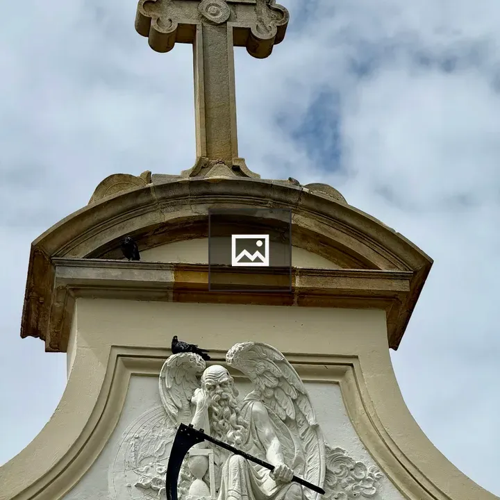 Angel of Death Sculpture at Cemetery Gate