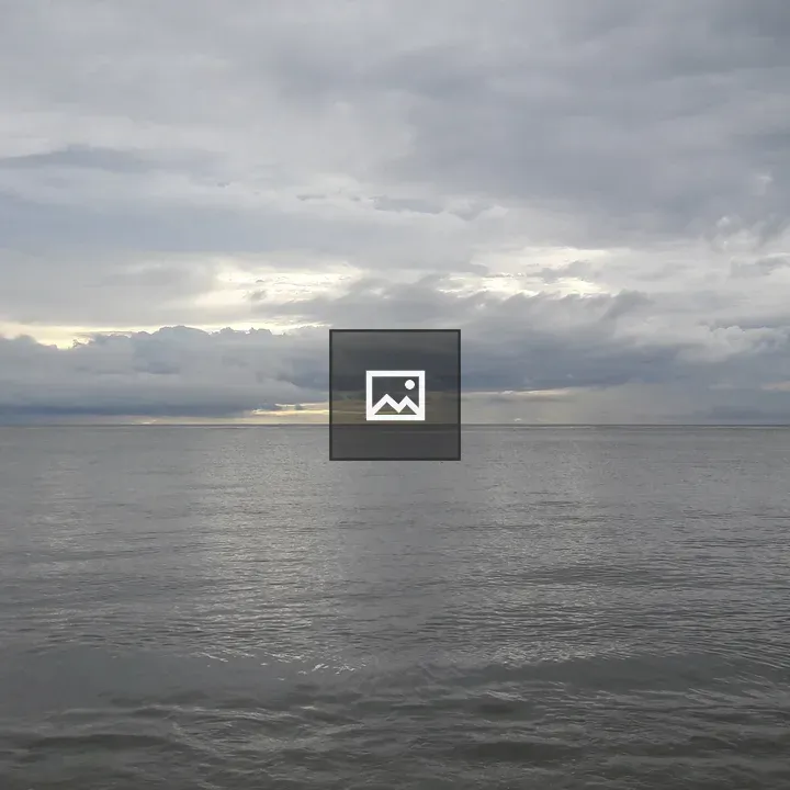 Grey Sky Over Calm Sea