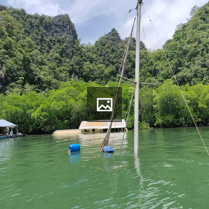 Two Blue Barrels on Water