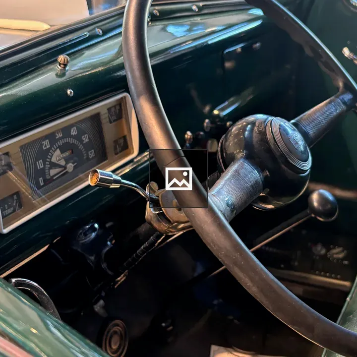Steering wheel and dash of a 1946 Ford pickup