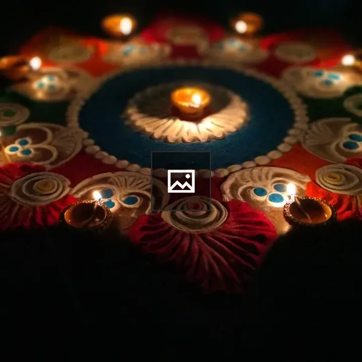 Diwali diya candles and sand mandala