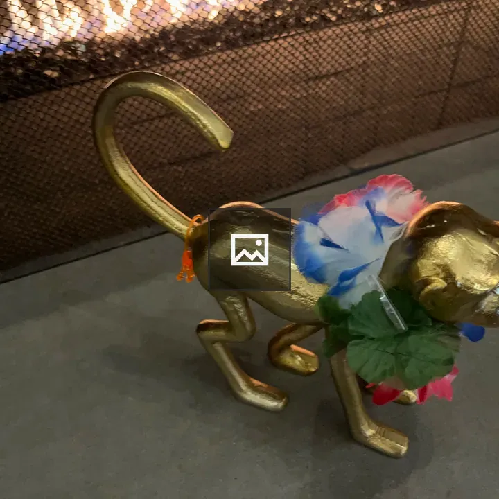 Decorated metal monkey statue