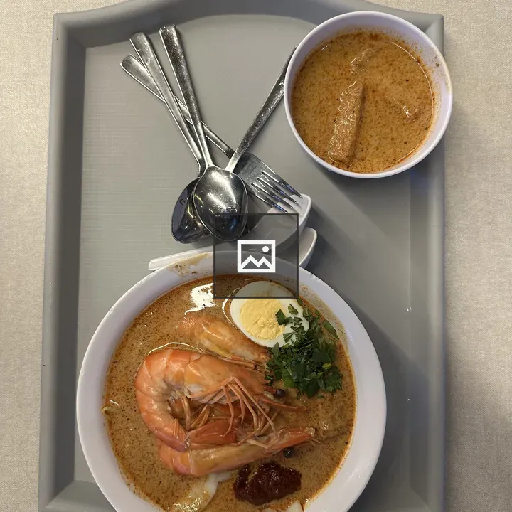 Tray with curry noodle soup
