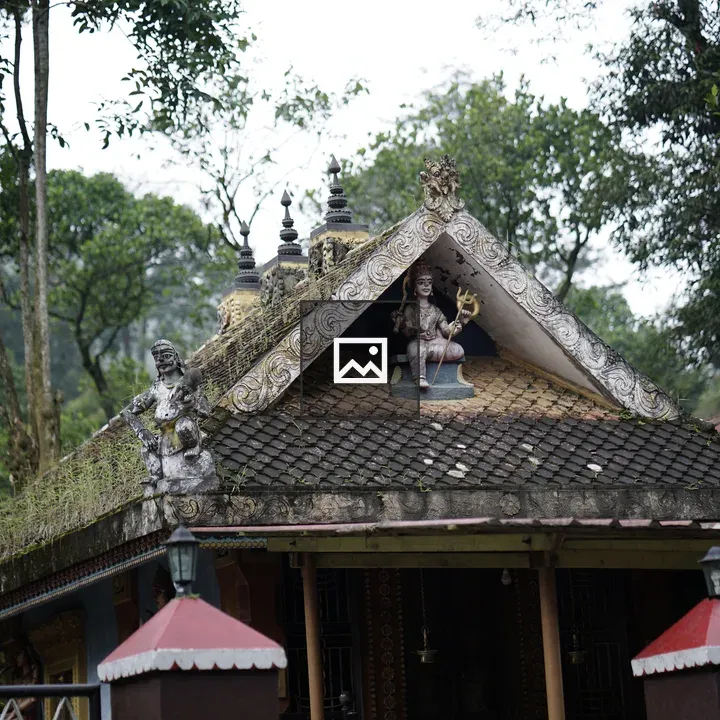 Temple Roof with Statue