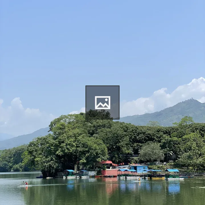 Fewa Lake Boats and Mountain