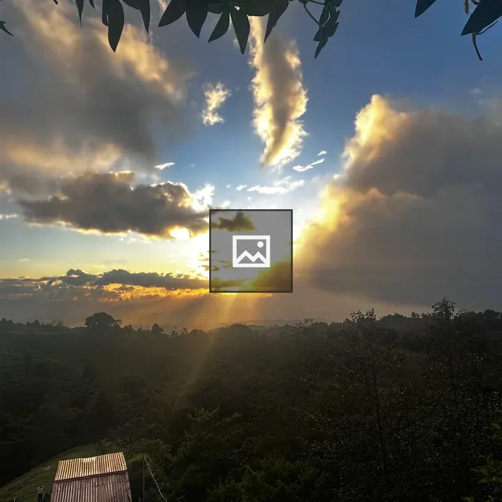 Sunset Landscape with Clouds and Hills
