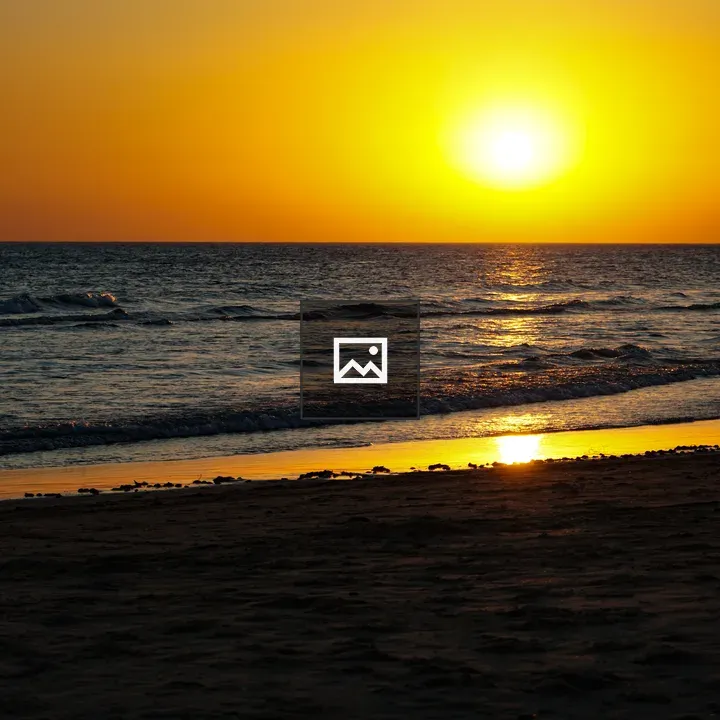 Sunset over the ocean from a beach