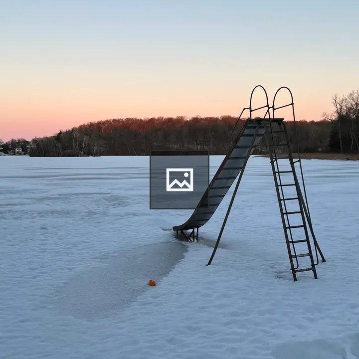 Metal slide on frozen beach