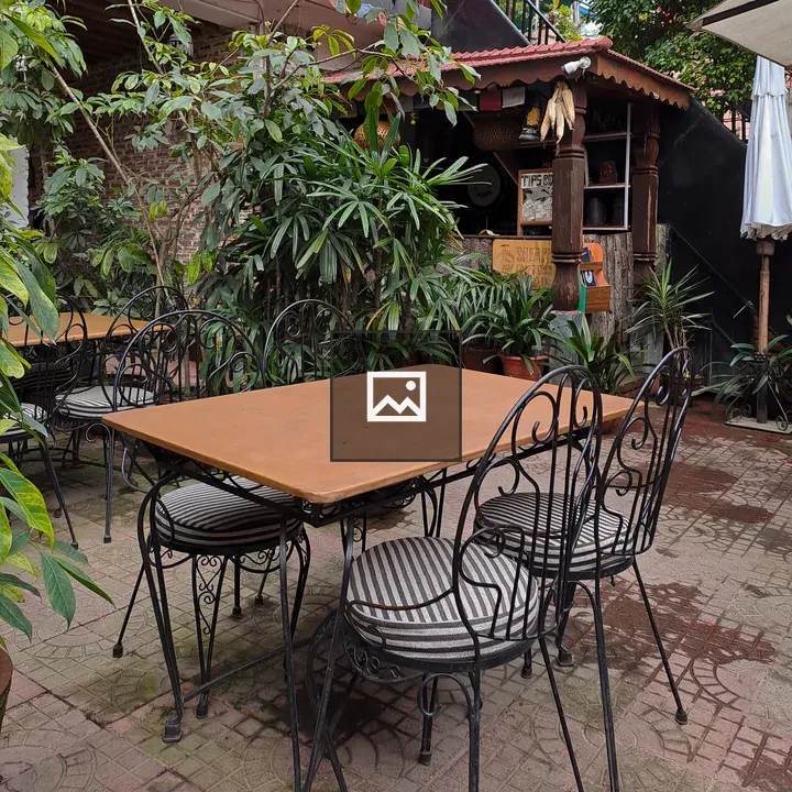 Wooden dining table with chairs