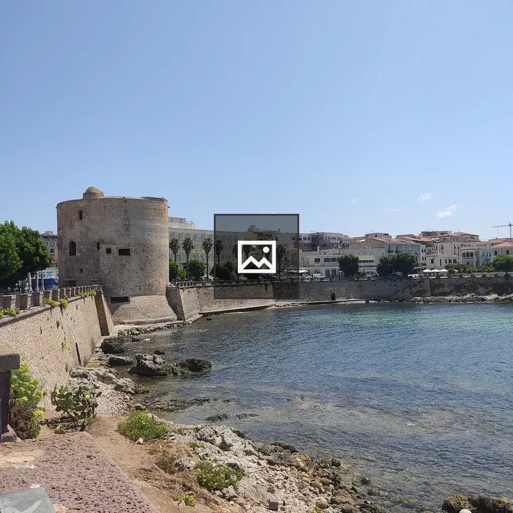 Alghero Cityscape with Sky and Water