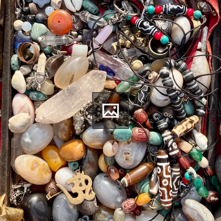 Stone and jewelry collection in red-lined box