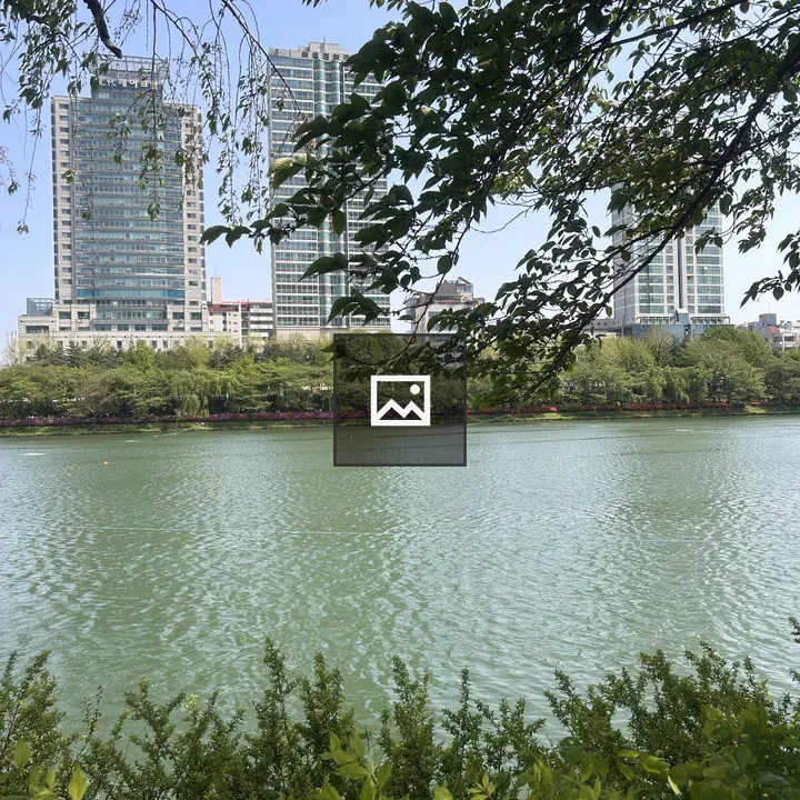 Peaceful Water and Green Bushes
