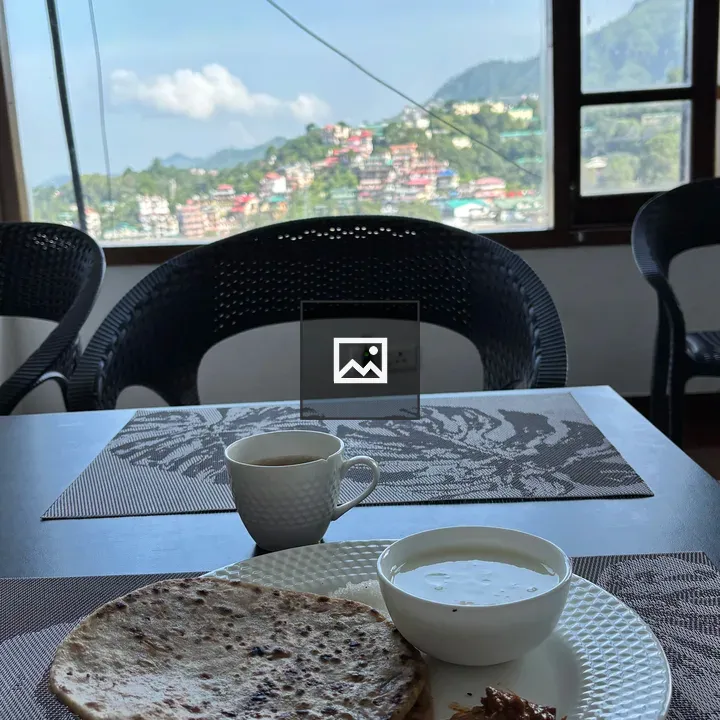 Two stuffed parathas on table