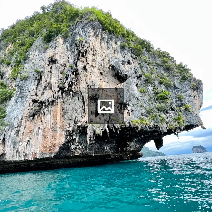 Karst Cliff Over Turquoise Sea