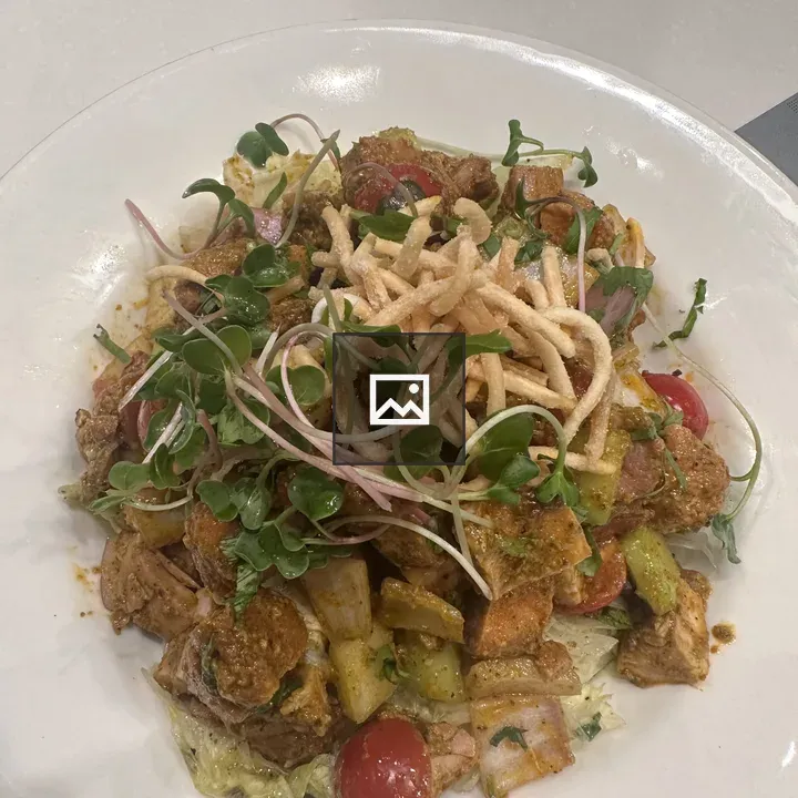 Plate of mixed salad with chicken