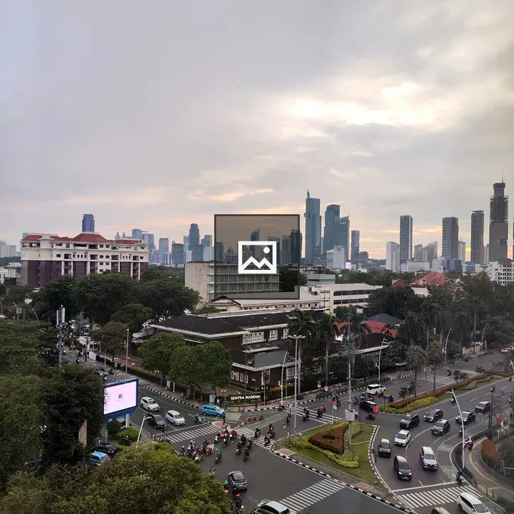 City intersection with skyline