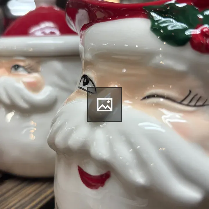 Holiday mugs with Santa face