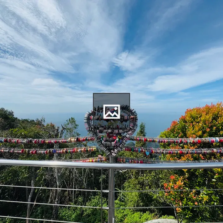 Heart-shaped metal structure with colorful locks