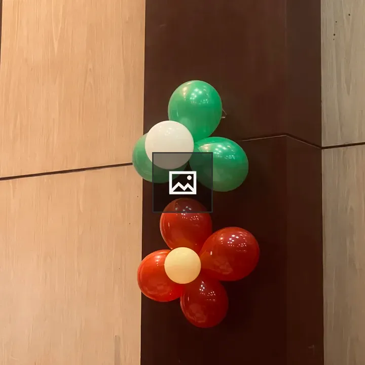 Two flower-shaped balloon arrangements