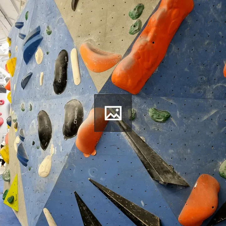 Indoor bouldering wall with holds