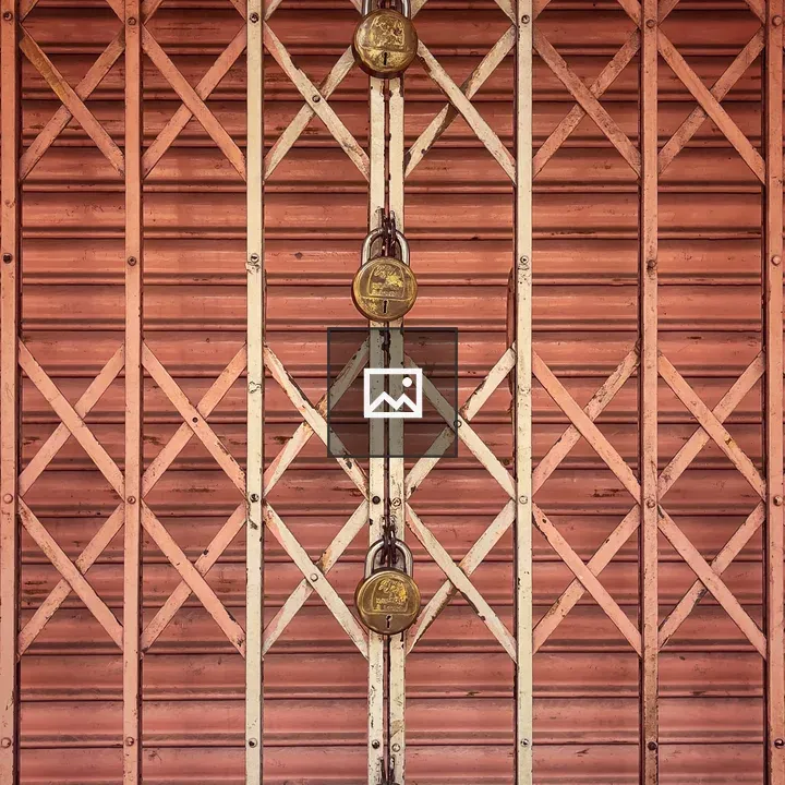 Shuttered shop with padlocks